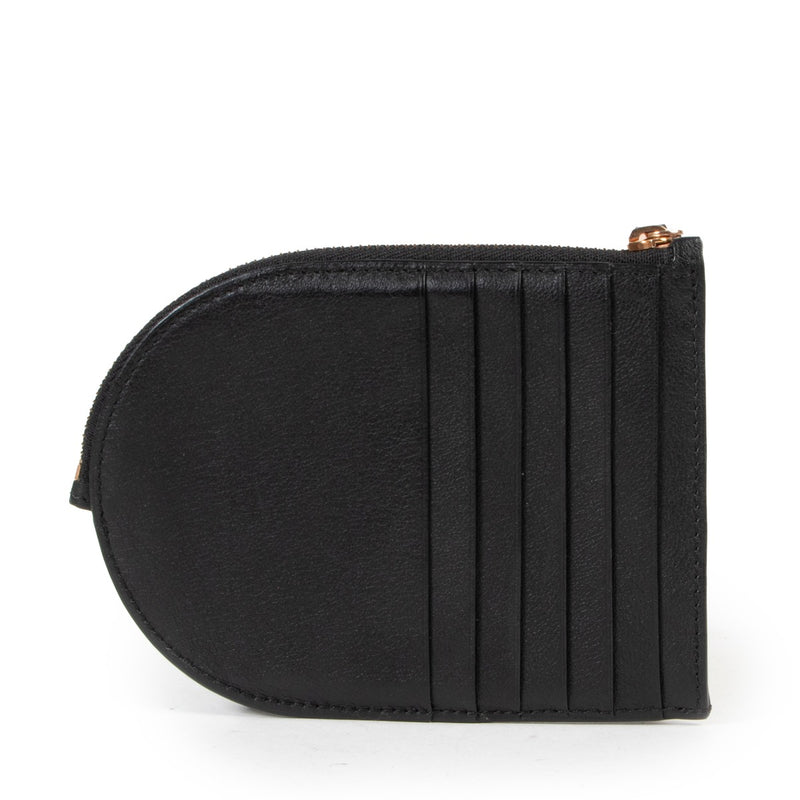 Buy in very good condition a Delvaux Black Leather Wallet