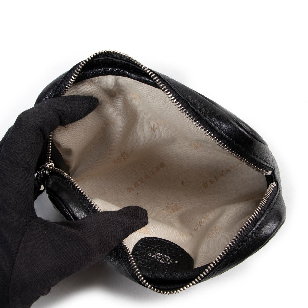 Buy Delvaux Black Leather Pochette PM reliably.