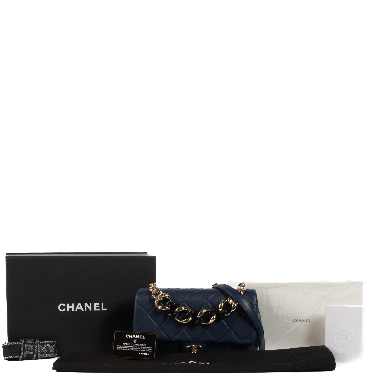 Shop safe online at Labellov in Antwerp, Brussels and Knokke this 100% authentic second hand Chanel Blue Lambskin Resin Chain Flap Crossbody Bag