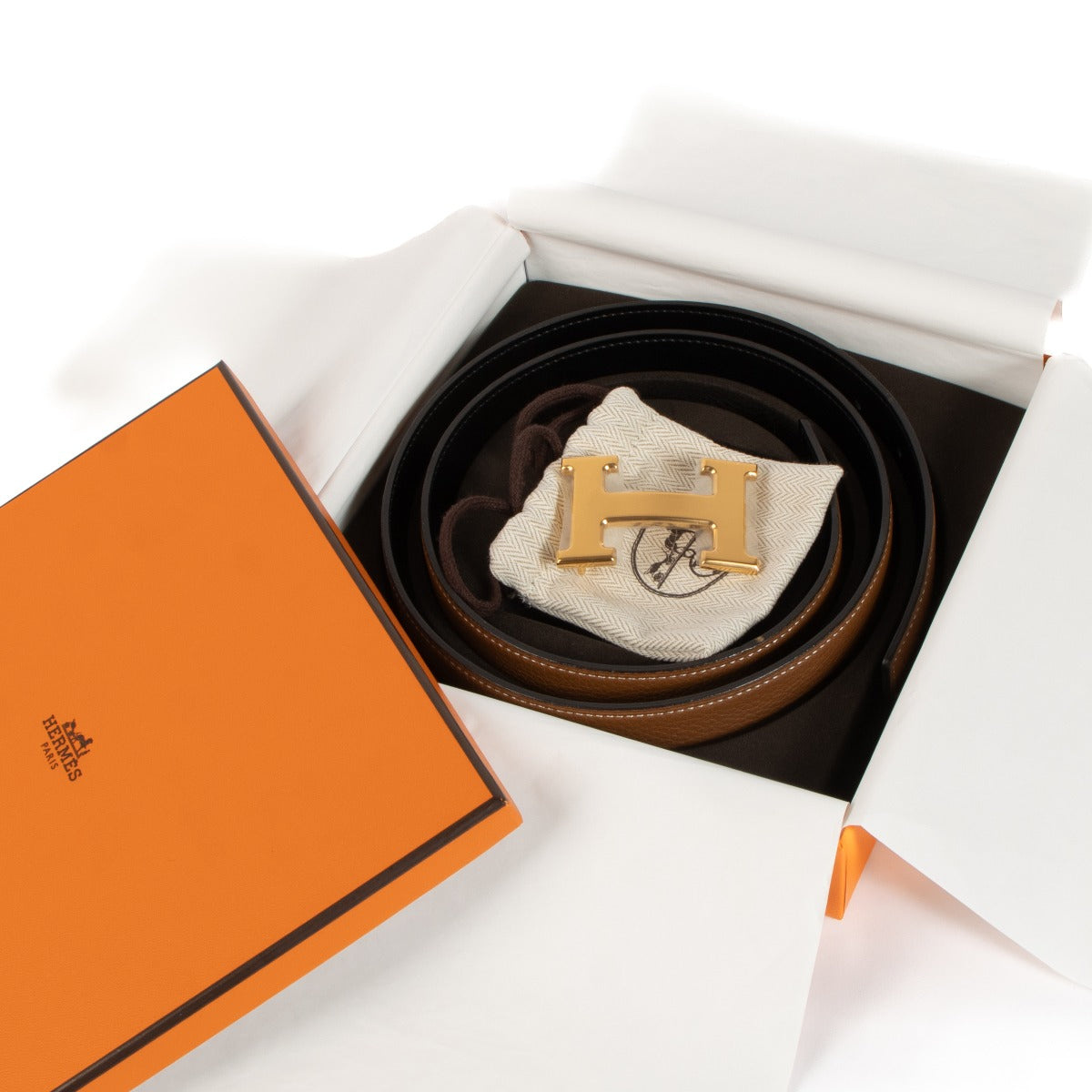 Second hand Authentic Hermès Gold/Black Reversible Constance H Buckle Belt on www.labellov.com