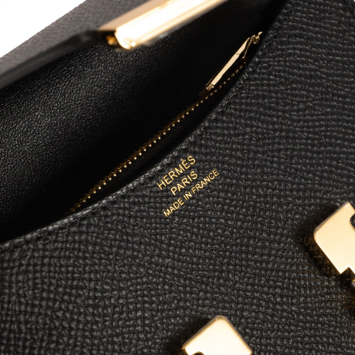 Shop safe online at Labellov in Antwerp, Brussels and Knokke this 100% authentic second hand Hermès Noir Epsom Constance Slim Wallet