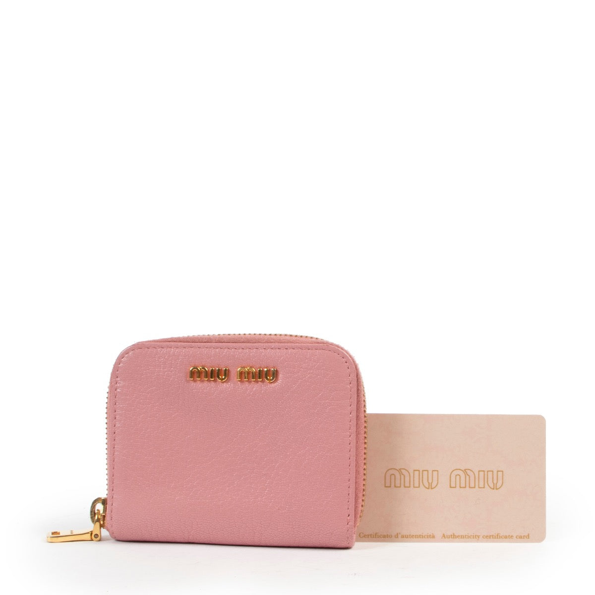 Buy a 100% authentic second hand Miu Miu Pink Zippy Wallet at Labellov