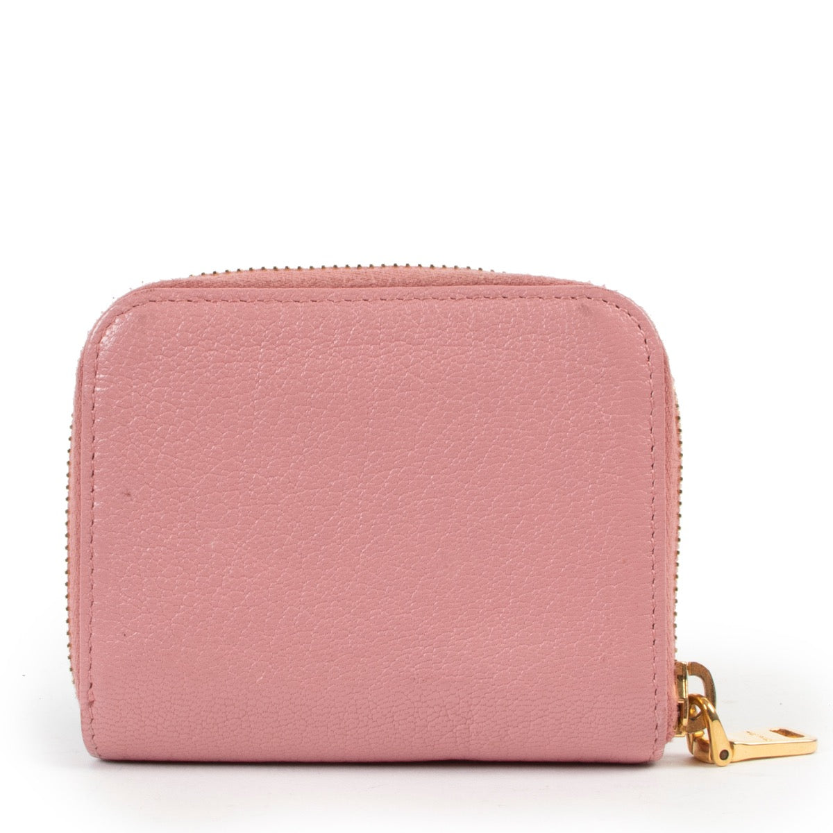 Buy a 100% authentic second hand Miu Miu Pink Zippy Wallet at Labellov