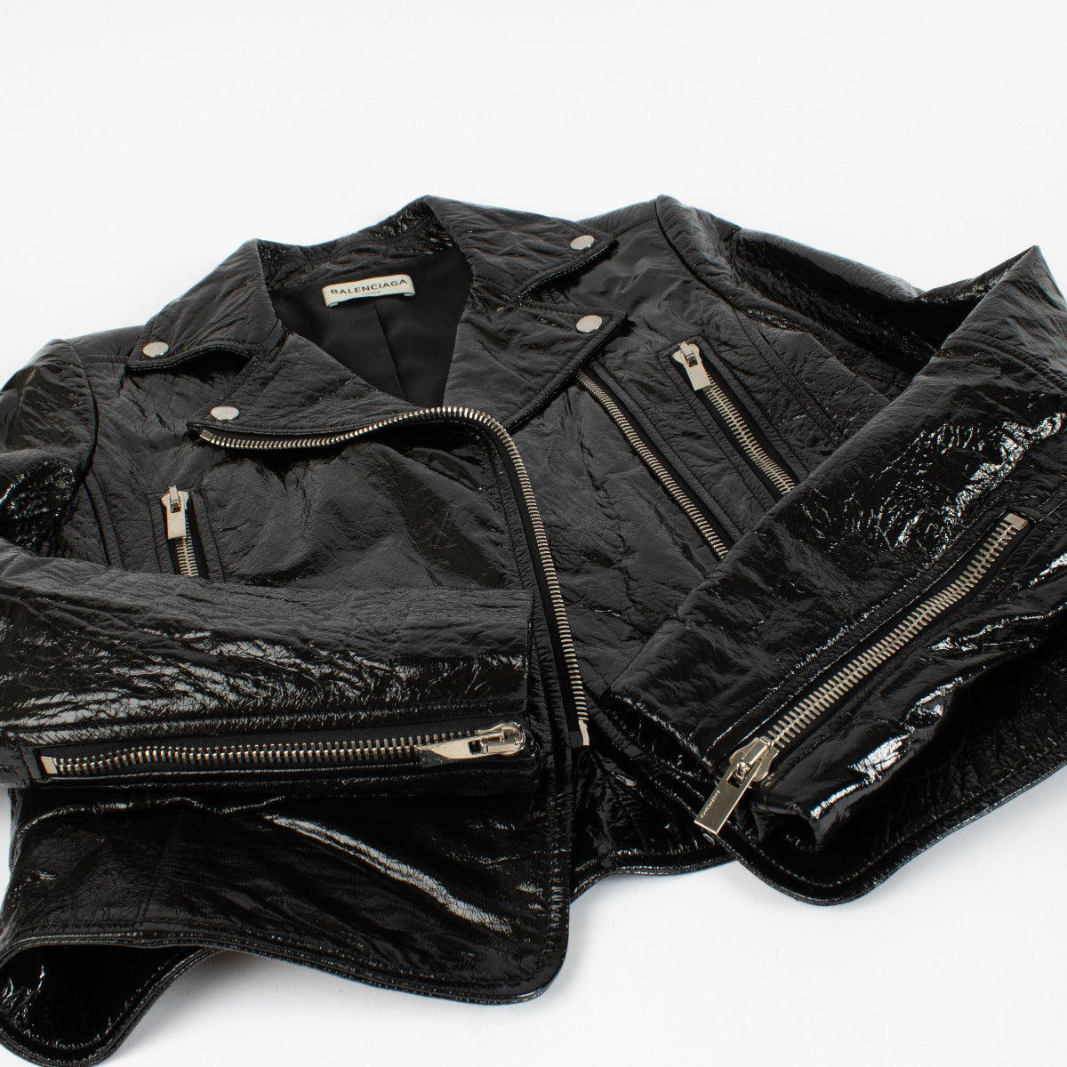 Blouson de motard Balenciaga en cuir verni noir