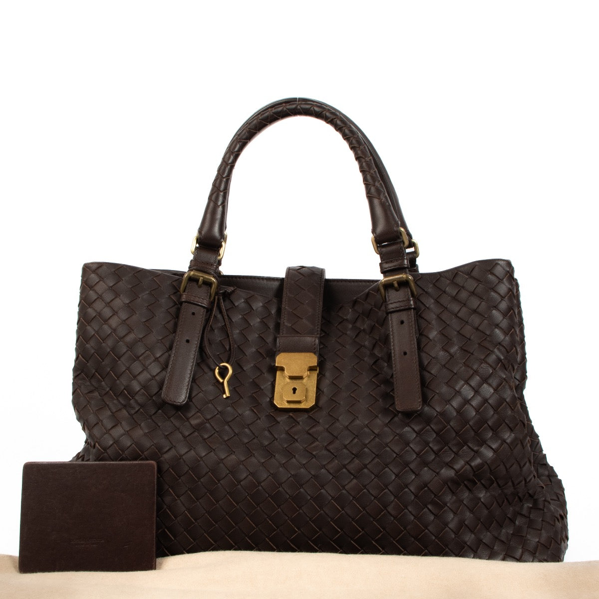 Buy an authentic Bottega Veneta Brown Leather Roma Top Handle on Labellov.com