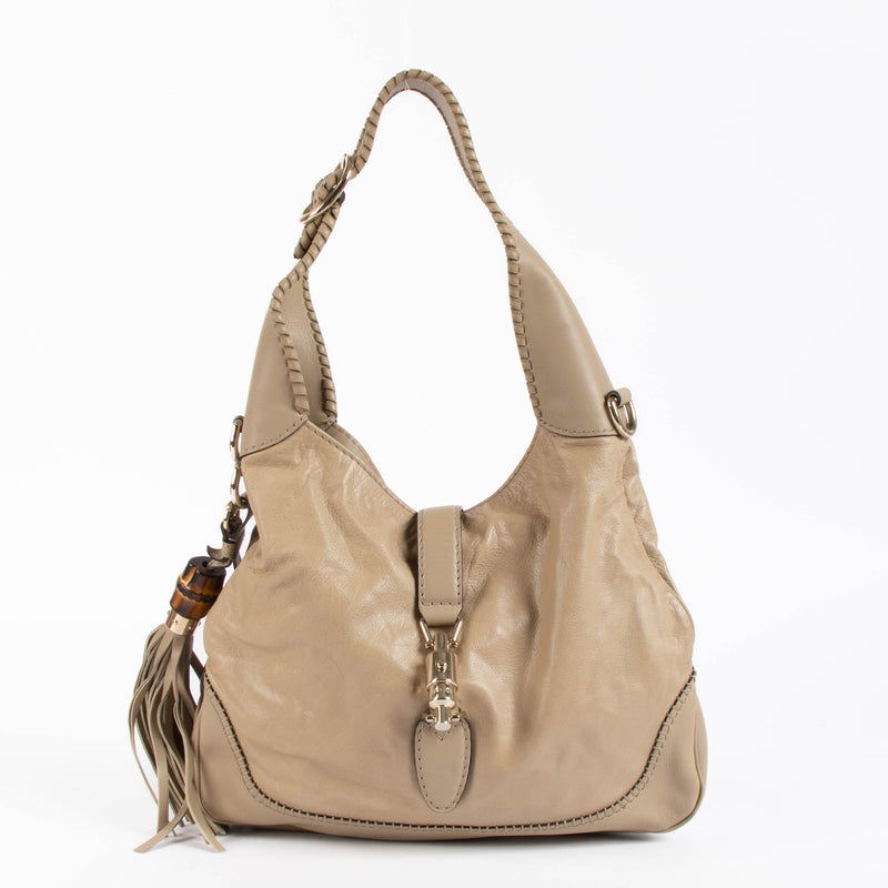 Shop the authentic Gucci Beige Leather Jackie Shoulder Bag second hand on Labellov.com