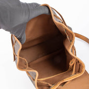 Shop the authentic Louis Vuitton Monogram Montsouris PM Backpack second hand on Labellov.com