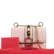 Valentino Pink Glam Rock Rockstud Mini Crossbody in perfect condition for the best price at Labellov secondhand luxury marketplace. Buy and sell your designer bags online.