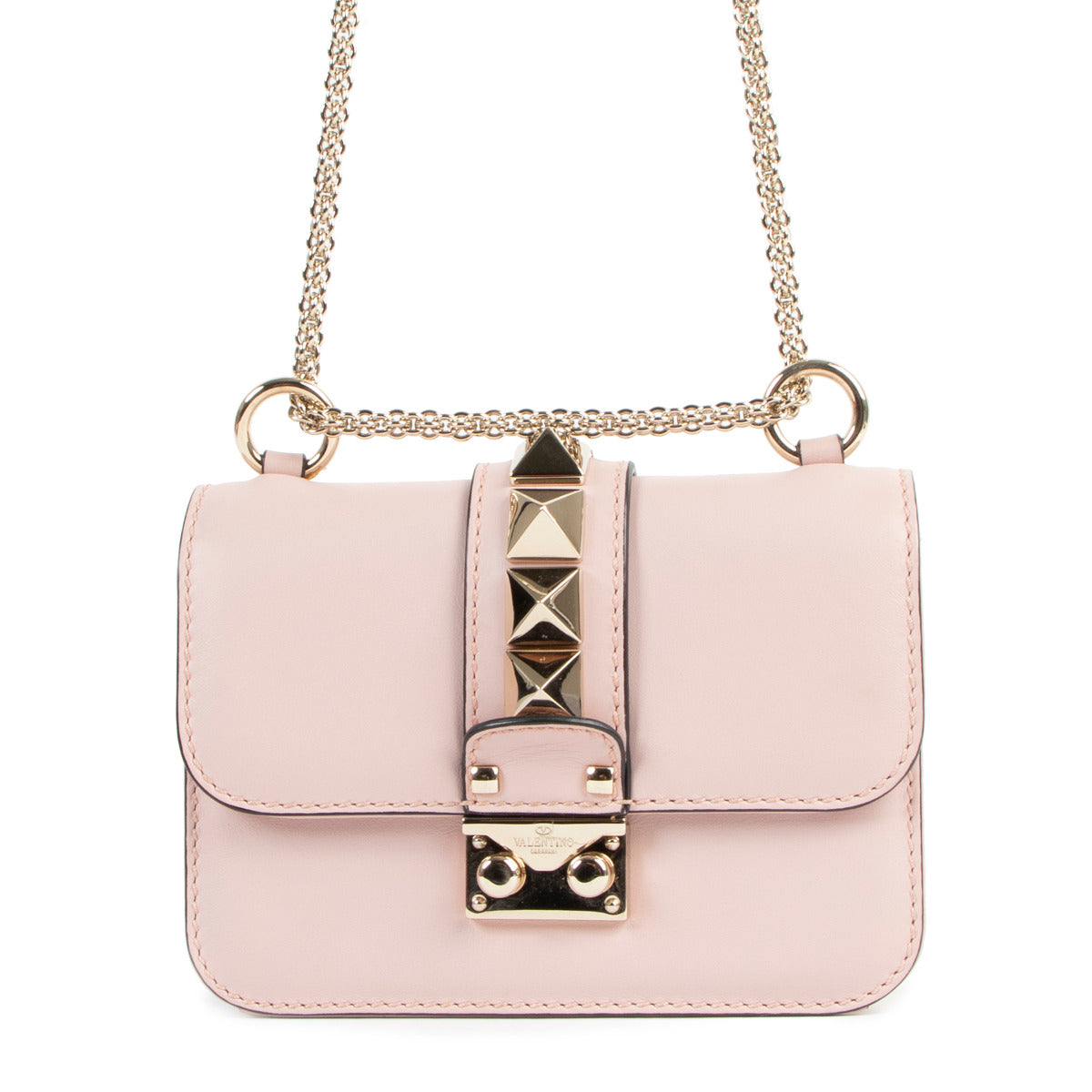 Valentino Pink Glam Rock Rockstud Mini Crossbody for the best price at designer vintage webshop Labellov. Find the bag you want online at Labellov designer luxury store.