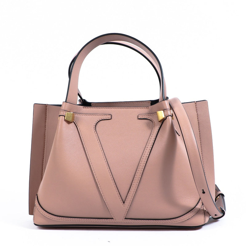 Buy an authentic second-hand Valentino Garavani Pink Rockstud Leather Shoulder Bag in very good condition at Labellov in Antwerp.