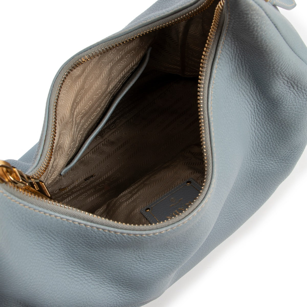 Shop authentic second hand vintage designer high end fashion Prada Lake Blue Vitello Daino Hobo Bag at Labellov.