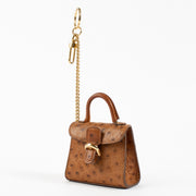 Authentic second hand Delvaux Brown Ostrich Brillant Bag Charm on Labellov.com