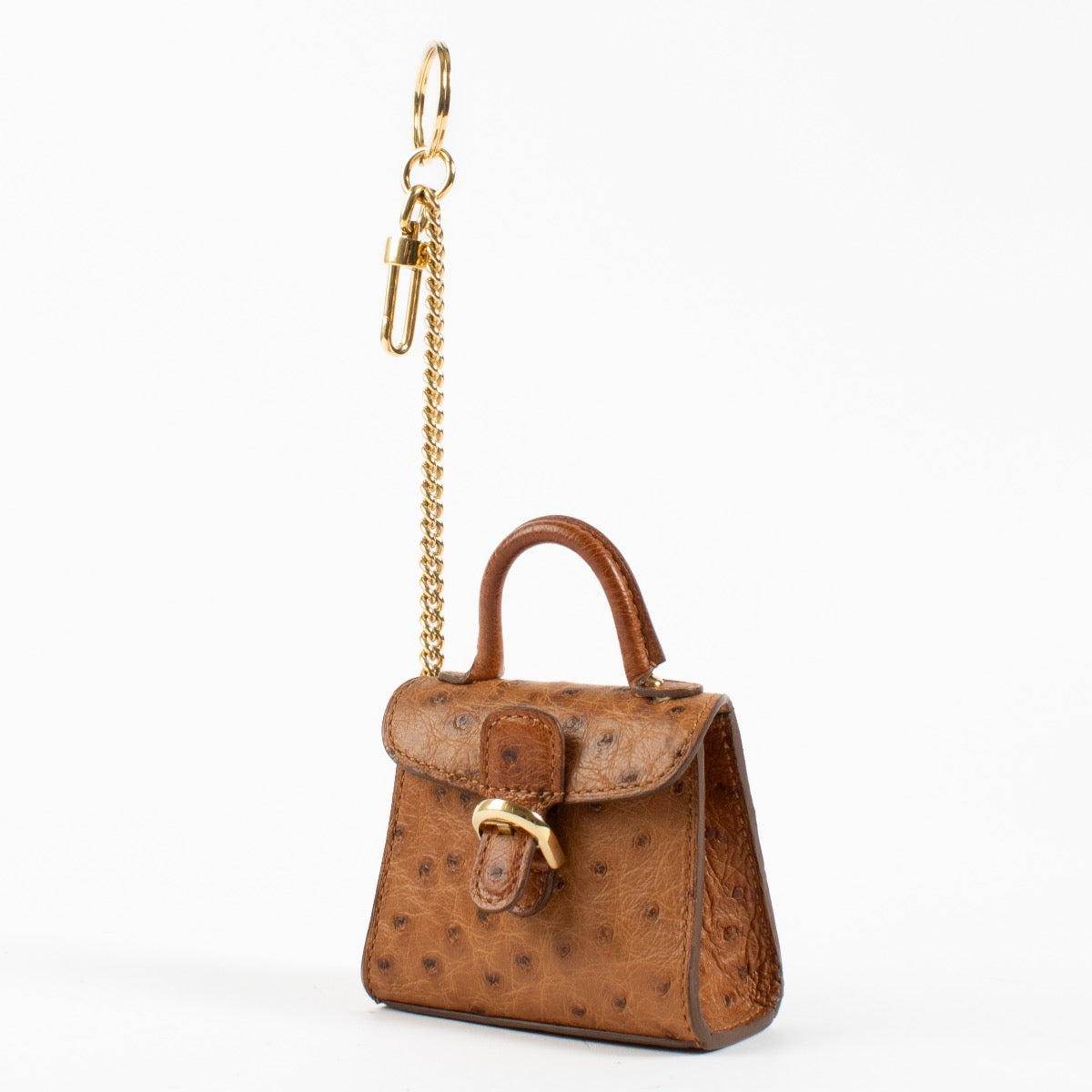 Authentic second hand Delvaux Brown Ostrich Brillant Bag Charm on Labellov.com