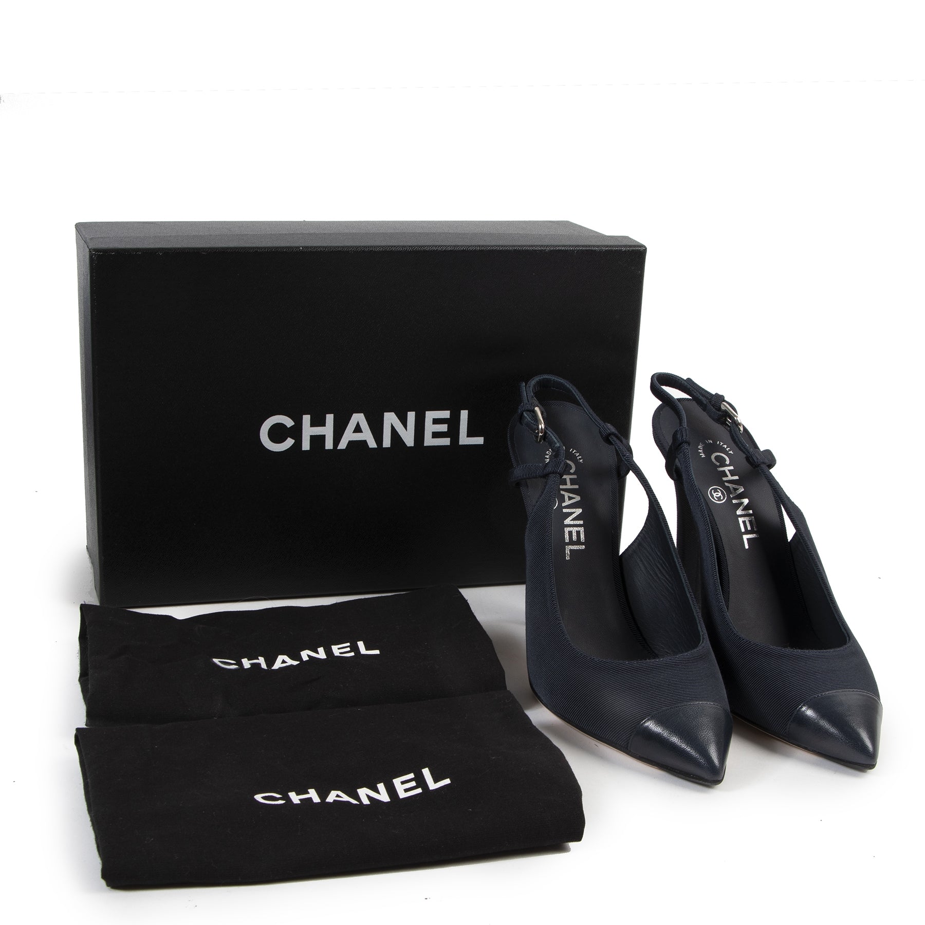 We buy and sell your authentic designer bags for the best price at labellov Chanel Blue Fabric Pumps - size 38.5