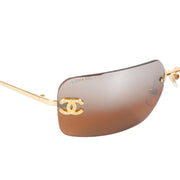 Authentieke Tweedehands Chanel Gold Brown Rimless Crystal CC Logo Sunglasses juiste prijs veilig online shoppen luxe merken webshop winkelen Antwerpen België mode fashion