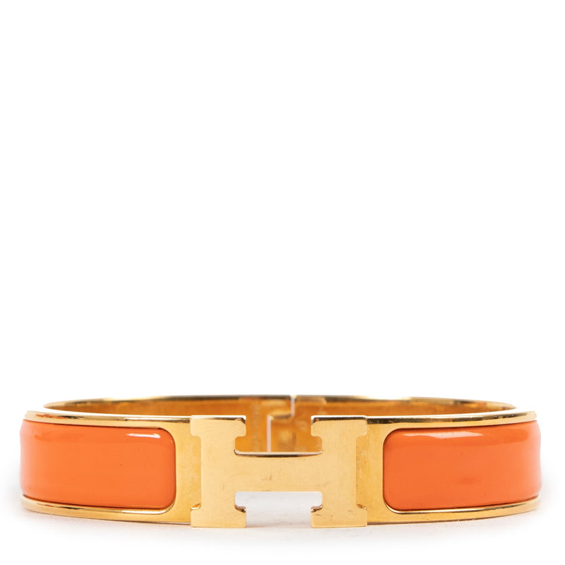 Shop safe online at Labellov in Antwerp this 100% authentic second hand Hermès Orange Clic H Bracelet - Size GM