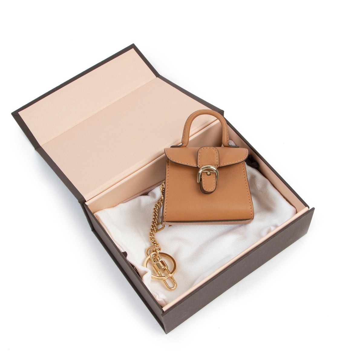 Buy an authentic second hand Delvaux camel Brillant bag charm at Labellov