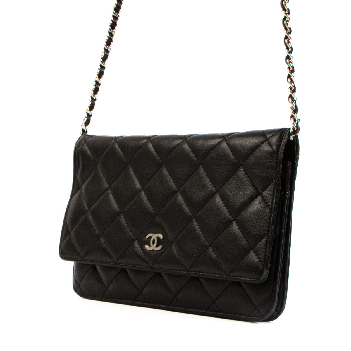 Compact and versatile, the WOC Flap Bag is designed to be the perfect companion for any occasion. Its sleek silhouette and iconic interlocking CC logo on the front flap make it a symbol of timeless fashion. Effortlessly transition from day to night by wea