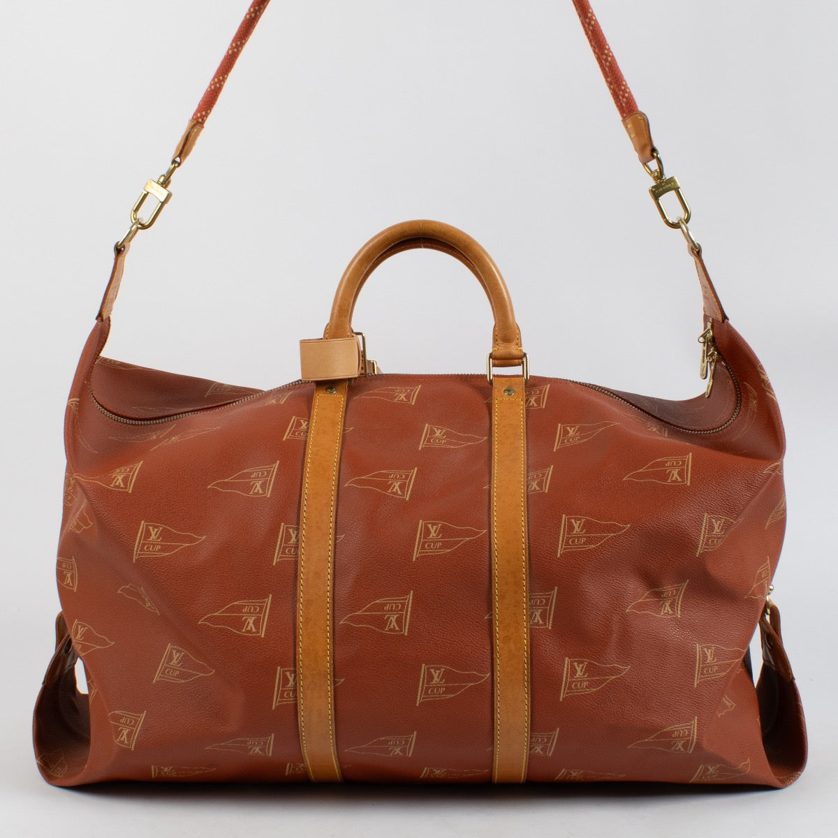 shop 100% authentic second hand Louis Vuitton 1995 LV America's Cup Red Canvas Keepall 60 Bag on Labellov.com