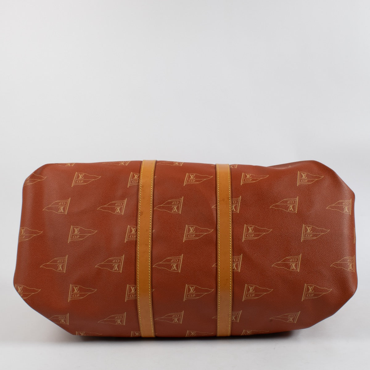 shop 100% authentic second hand Louis Vuitton 1995 LV America's Cup Red Canvas Keepall 60 Bag on Labellov.com