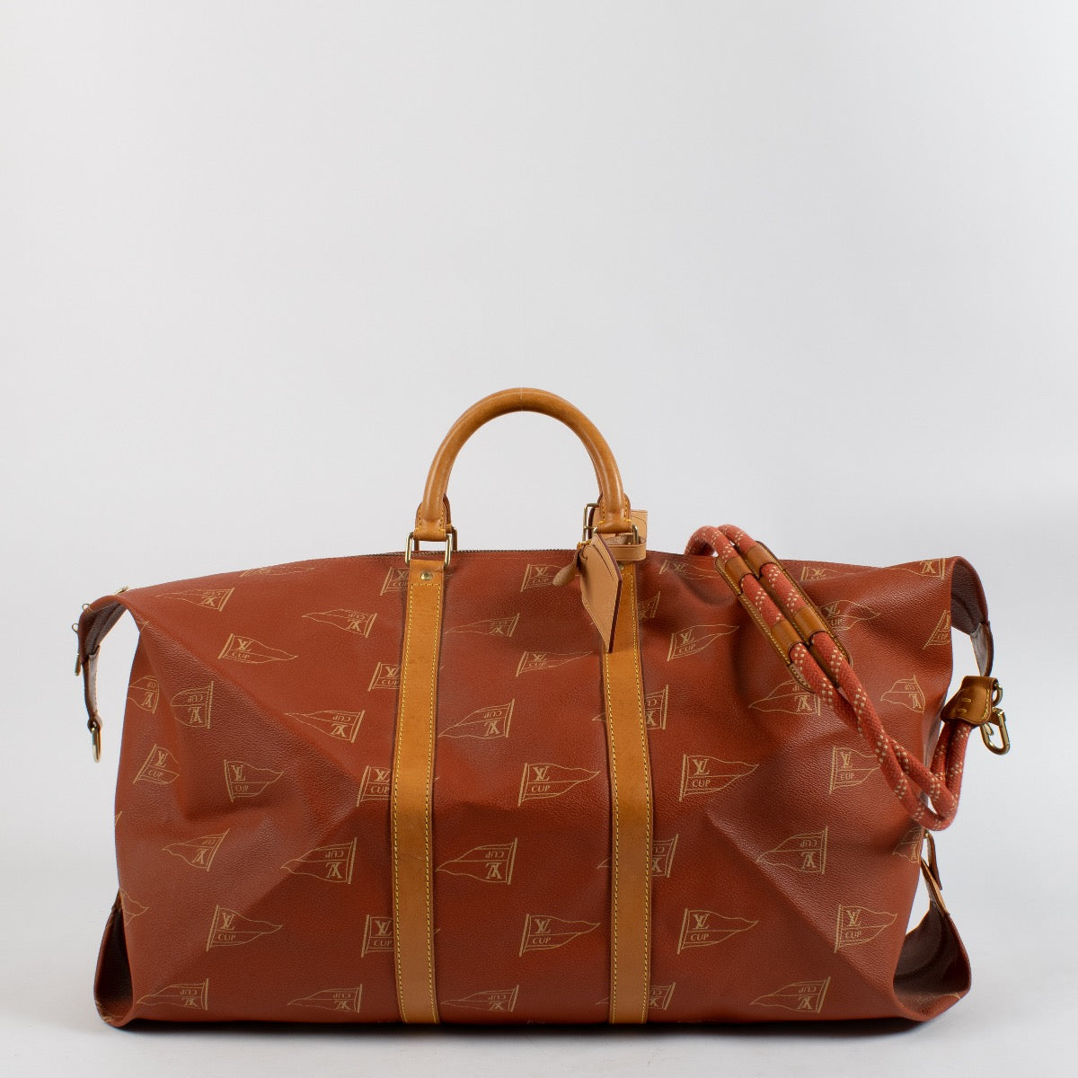 shop 100% authentic second hand Louis Vuitton 1995 LV America's Cup Red Canvas Keepall 60 Bag on Labellov.com