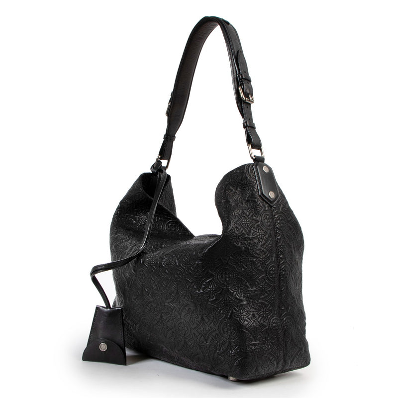 Buy an authentic second hand Louis Vuitton Black Leather Antheia Hobo Bag in very good condition at Labellov.
