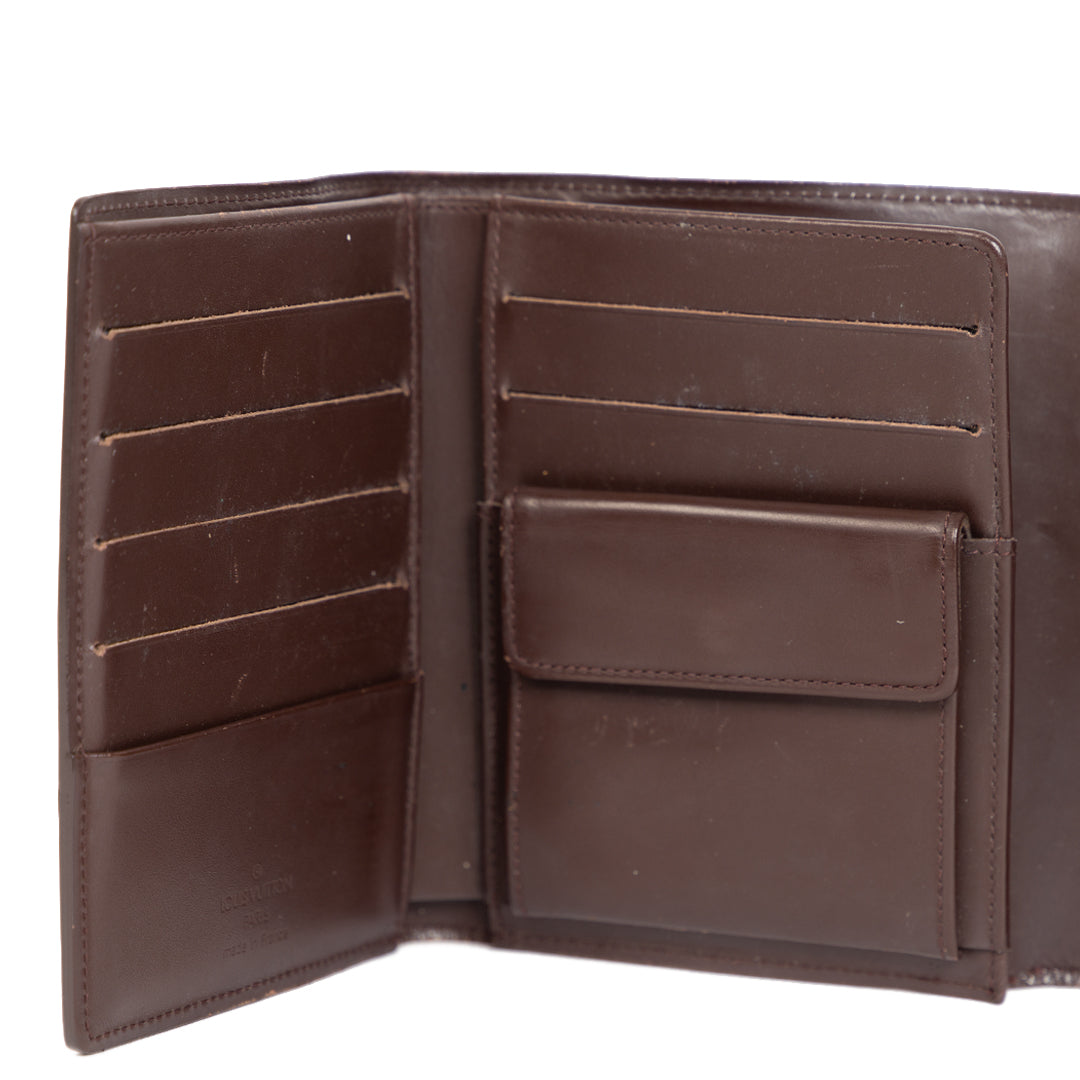 Buy online an authentic second hand Louis Vuitton brown élastique epi leather Wallet in good condition at Labellov in Antwerp.