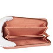 Fendi Brown/Pink Zippy Zucca Wallet pour le meilleur prix chez Labellov à Anvers