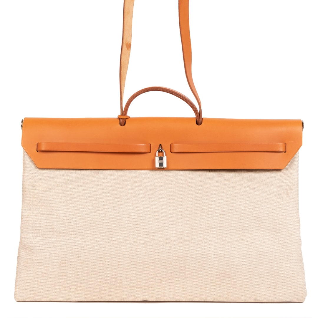 Buy and sell your authentic Hermès Large Toile Herbag online at Labellov
