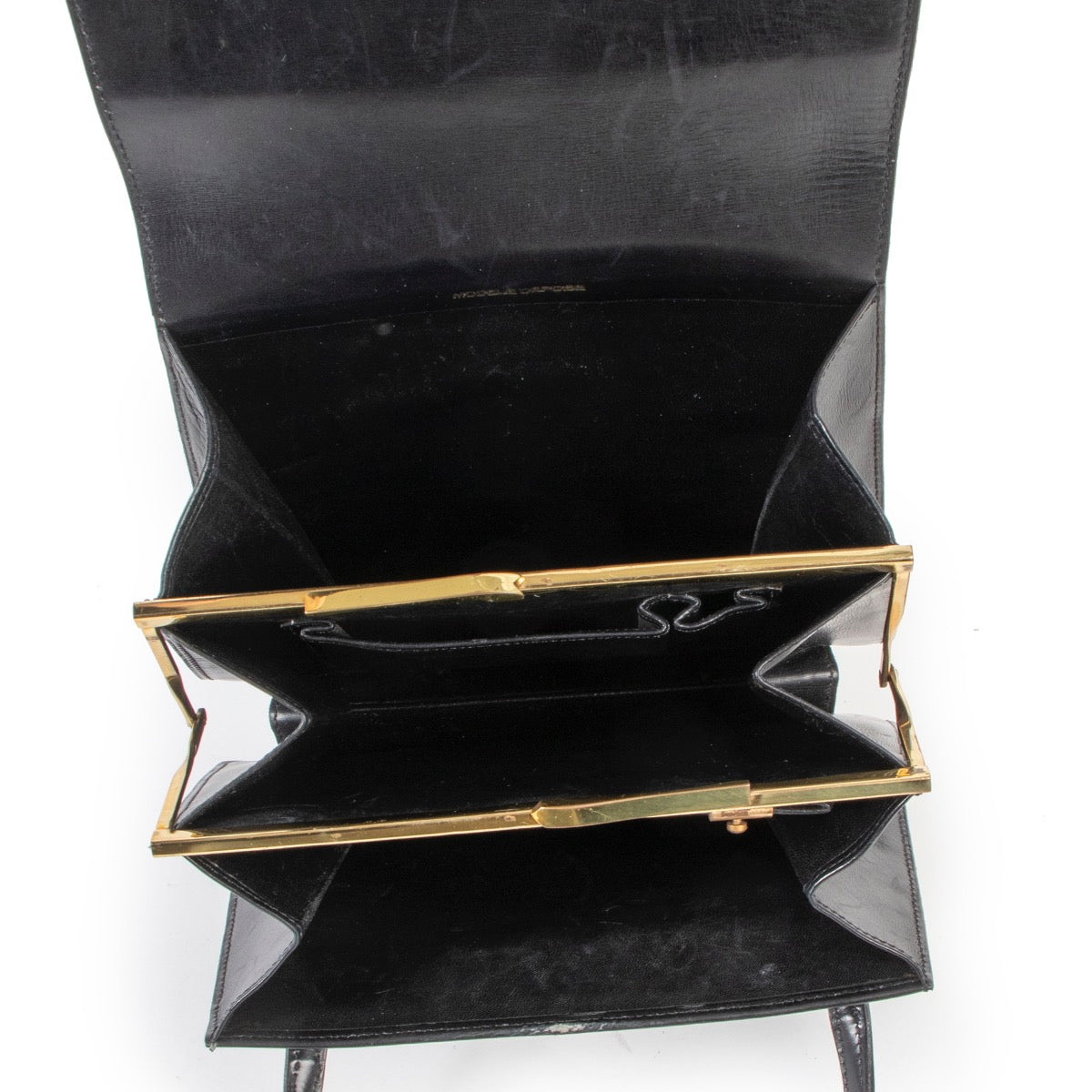 Buy this Delvaux Black Top Handle online or in store at Labellov Antwerp a luxury store that sells and buys secondhand items.