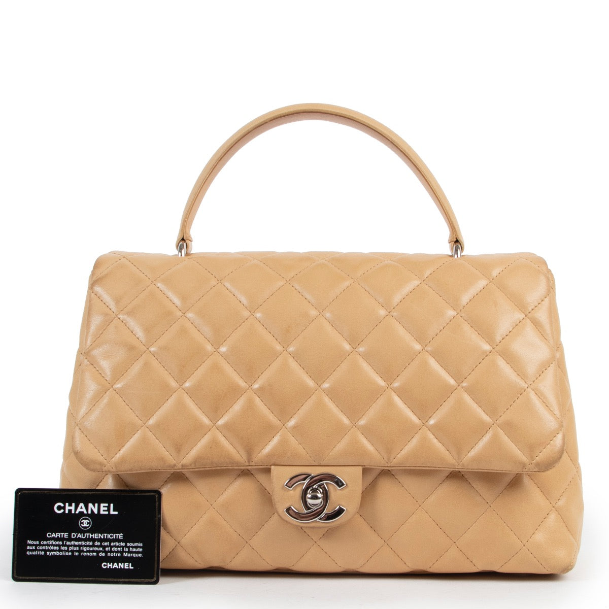 Shop safe online 100% authentic second hand Chanel Beige Quilted Lambskin Coco Top Handle at the right price at Labellov in Antwerp.