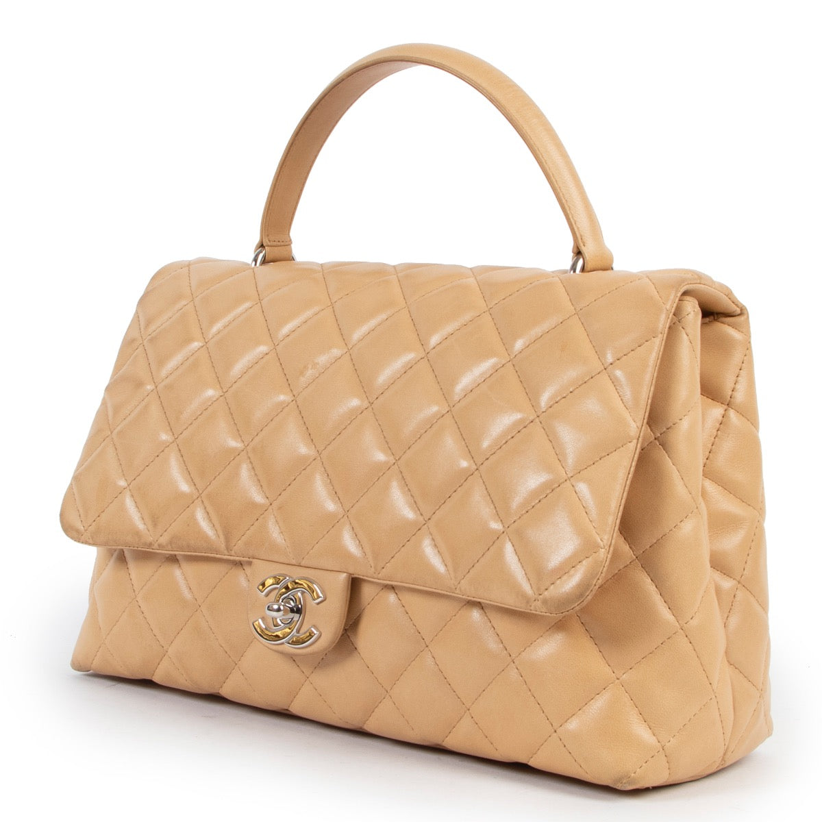 Shop safe online 100% authentic second hand Chanel Beige Quilted Lambskin Coco Top Handle at the right price at Labellov in Antwerp.