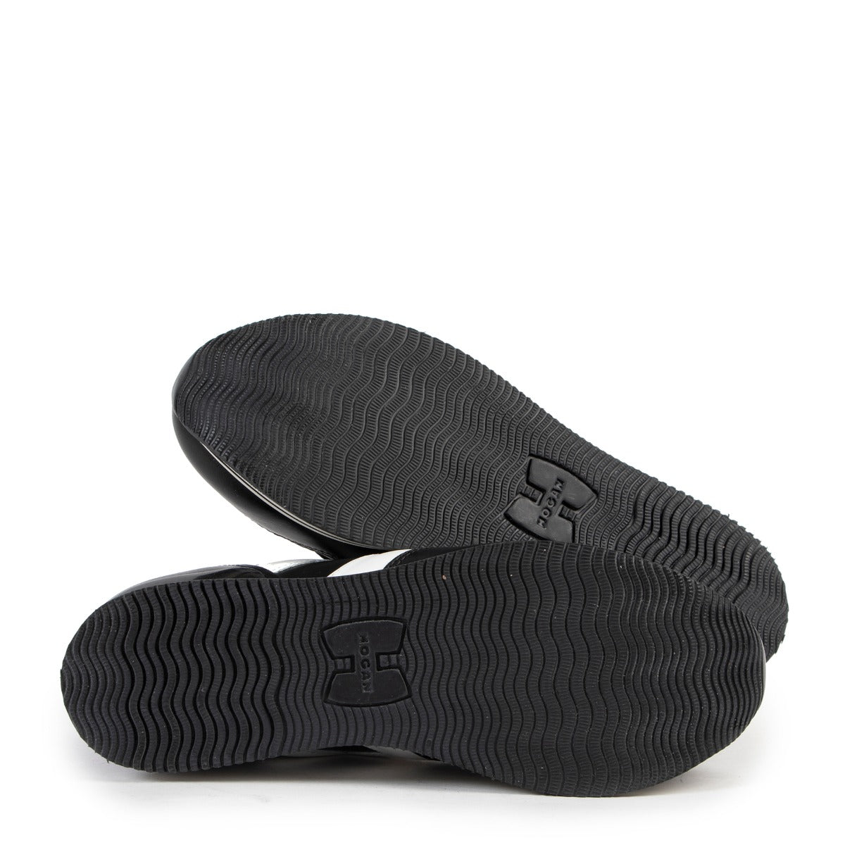 Leather Black and white Hogan Sneakers 2nd hand price on safe site