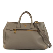 Shop safe online at Labellov in Antwerp, Brussels and Knokke this 100% authentic second hand Prada Taupe Leather Top Handle Bag