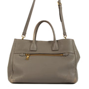 Shop safe online at Labellov in Antwerp, Brussels and Knokke this 100% authentic second hand Prada Taupe Leather Top Handle Bag