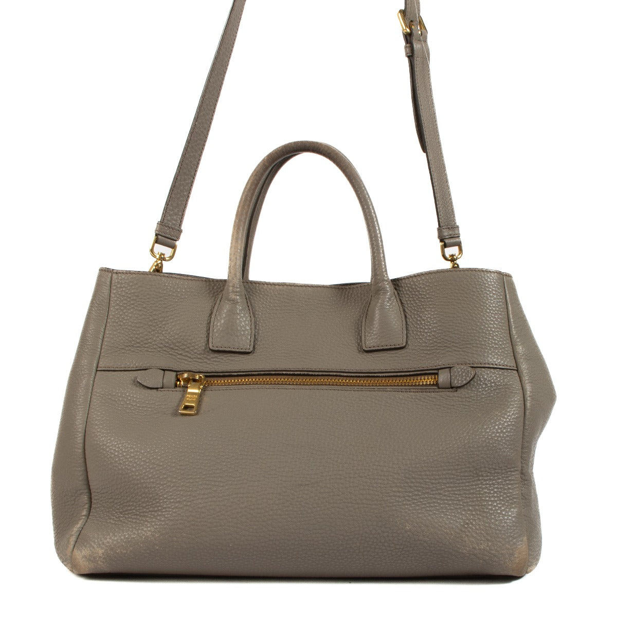 Shop safe online at Labellov in Antwerp, Brussels and Knokke this 100% authentic second hand Prada Taupe Leather Top Handle Bag