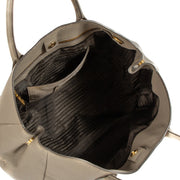Shop safe online at Labellov in Antwerp, Brussels and Knokke this 100% authentic second hand Prada Taupe Leather Top Handle Bag