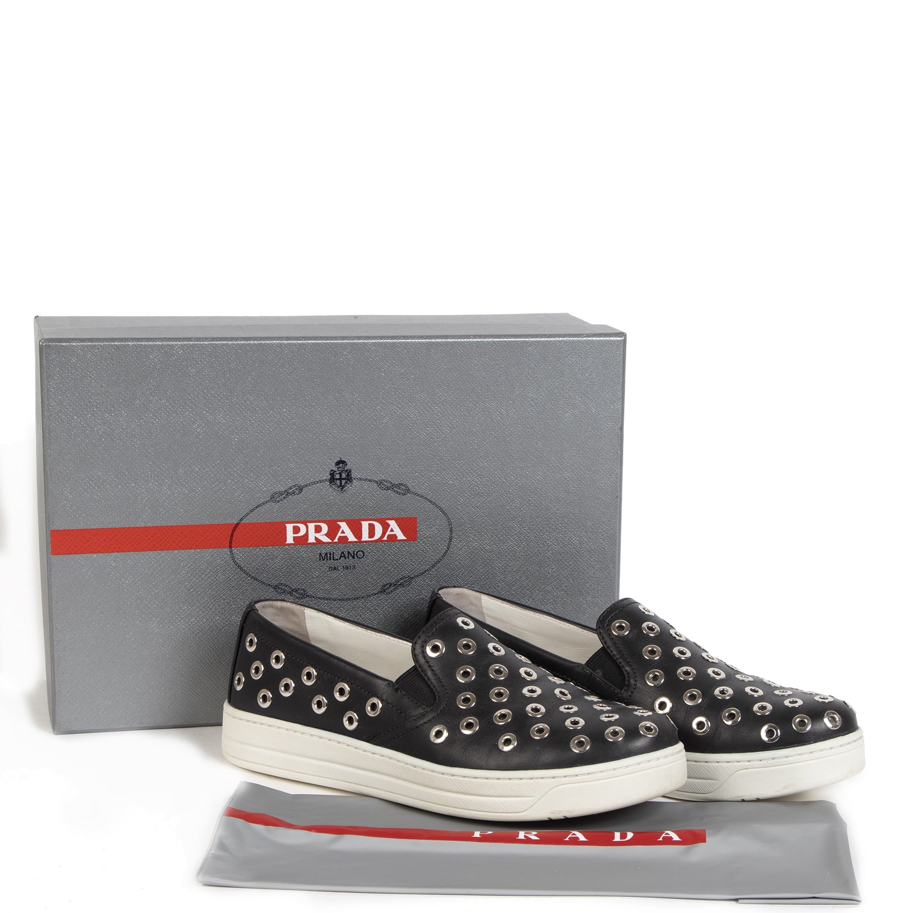 Authentic secondhand Prada Black Slip On Sneakers Silver Studs - size 36 right price safe and secure online shopping designer bags designer accessories designer sneakers shoes vintage webshop fashion worldwide shipping
