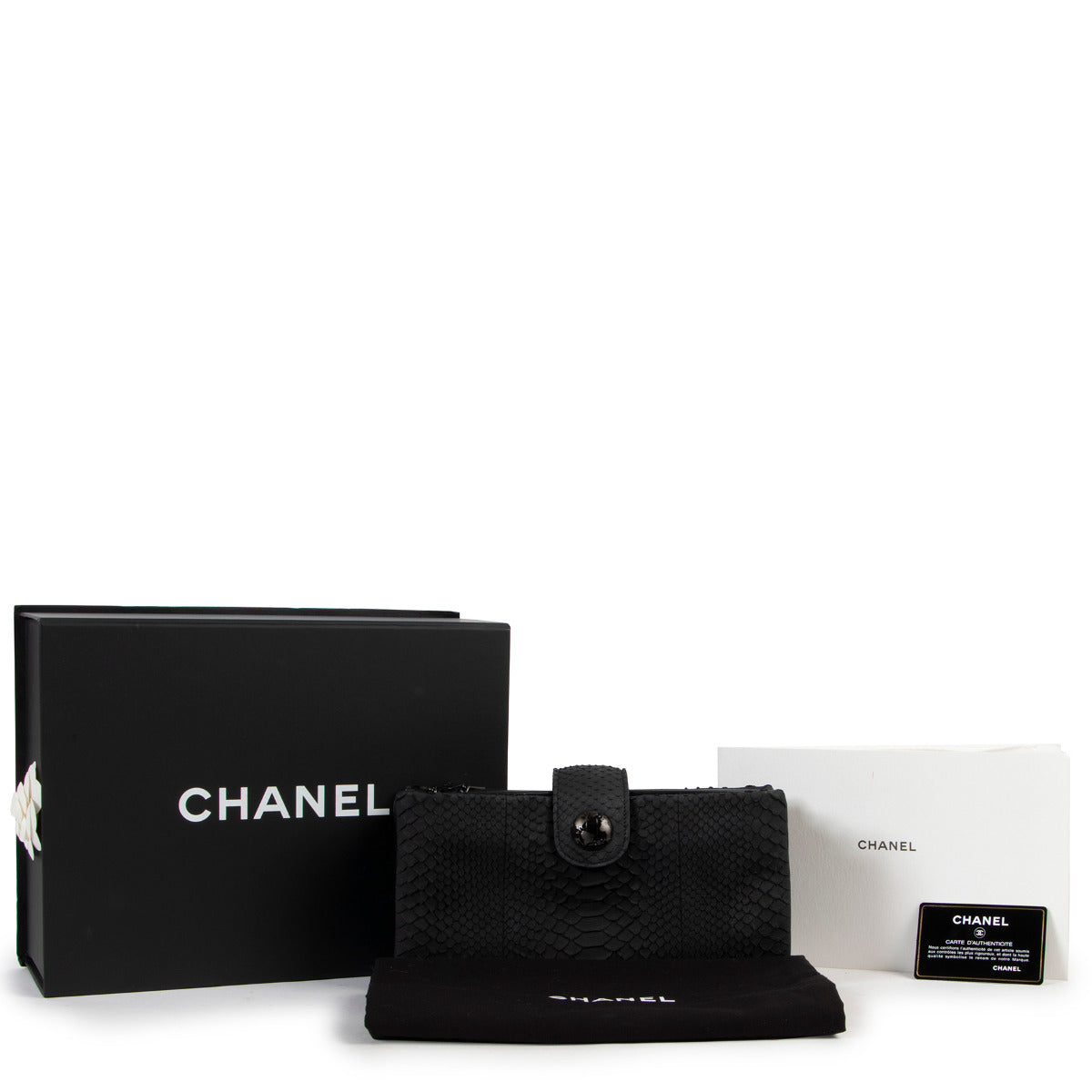 buy and sell one of a kind exclusive collectors pieces of brands such as Chanel and this stunning Chanel Black Python Multiflap Clutch Bag