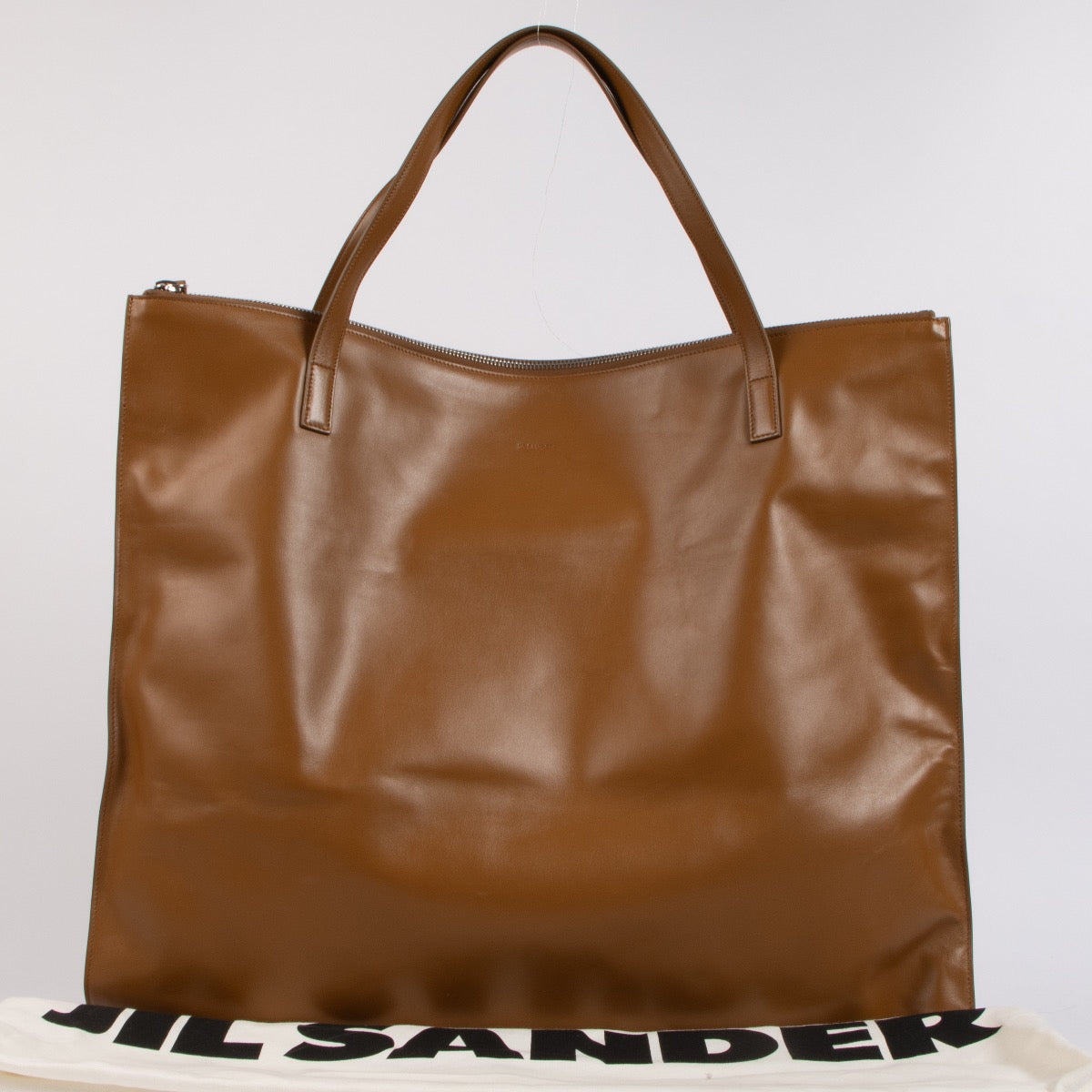 Shop 100% authentic second-hand Jil Sander Camel Leather Zip Large Tote Bag on Labellov.com