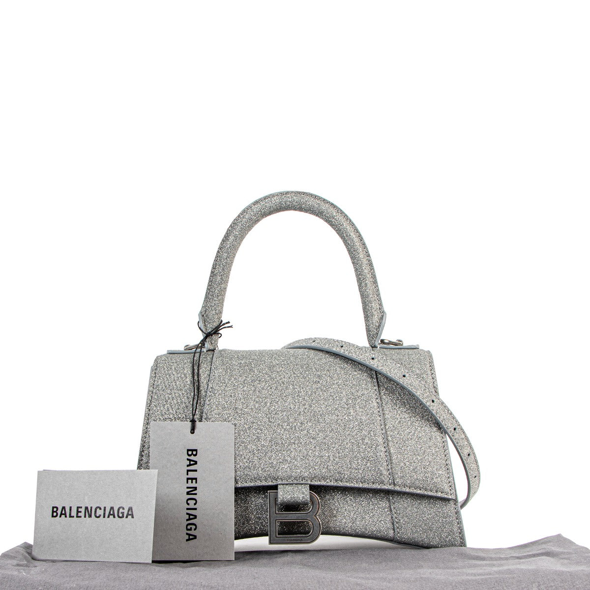 Exclusive and sold out collectors Balenciaga Hourglass Small Silver Glitter Bag for the best price at Labellov secondhand luxury