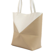 Shop safe online at Labellov in Antwerp and Knokke this 100% authentic second hand Loewe Beige Calfskin Puzzle Fold Tote Bag