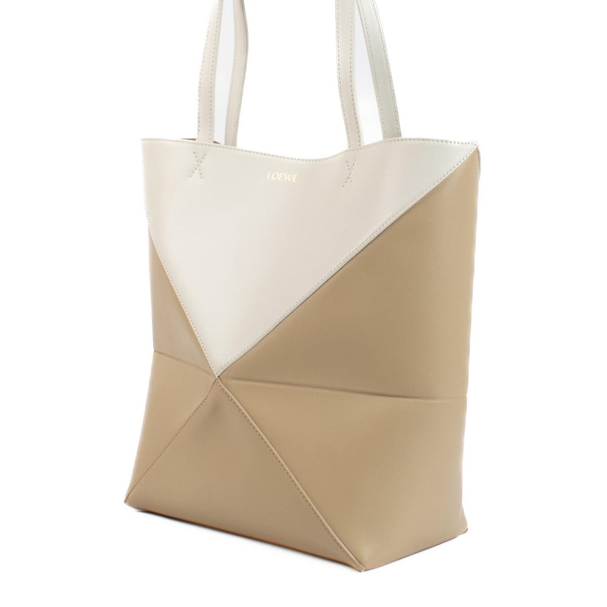Shop safe online at Labellov in Antwerp and Knokke this 100% authentic second hand Loewe Beige Calfskin Puzzle Fold Tote Bag