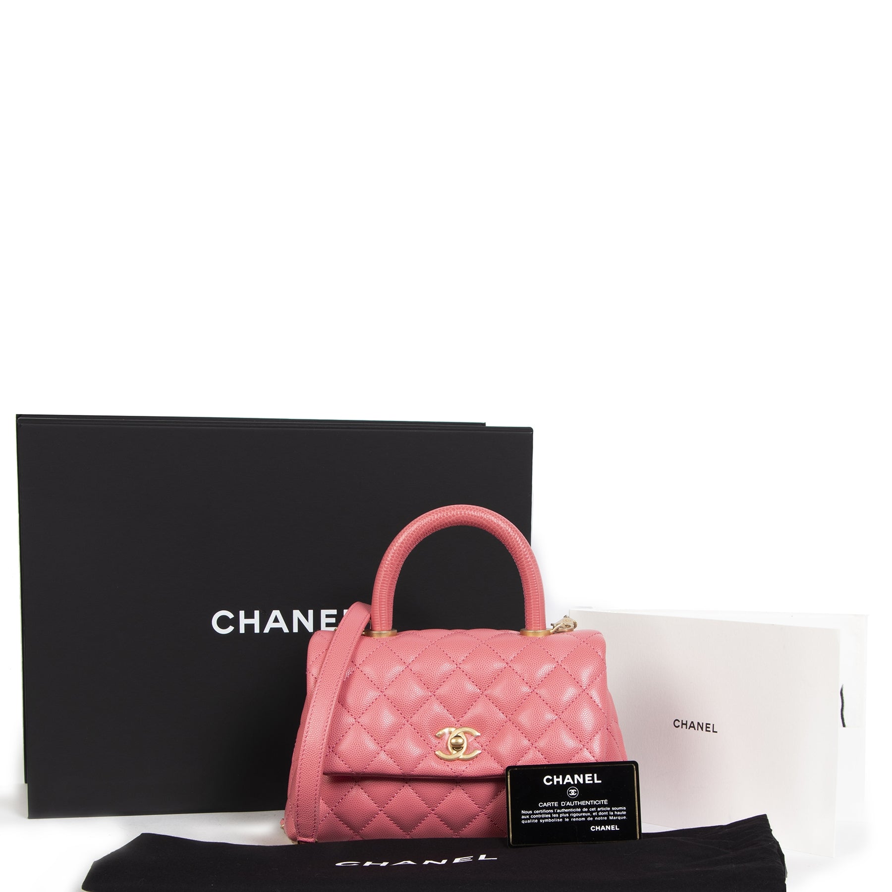 We buy and sell your authentic Chanel Pink Caviar Quilted Small Lizard Coco Handle Flap Bag