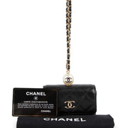 Buy authentic second hand Chanel Black Caviar Faux Pearl Card Holder / Coin Purse With Chain in brand new condition at Labellov in Antwerp.