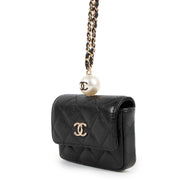Buy authentic second hand Chanel Black Caviar Faux Pearl Card Holder / Coin Purse With Chain in brand new condition at Labellov in Antwerp.