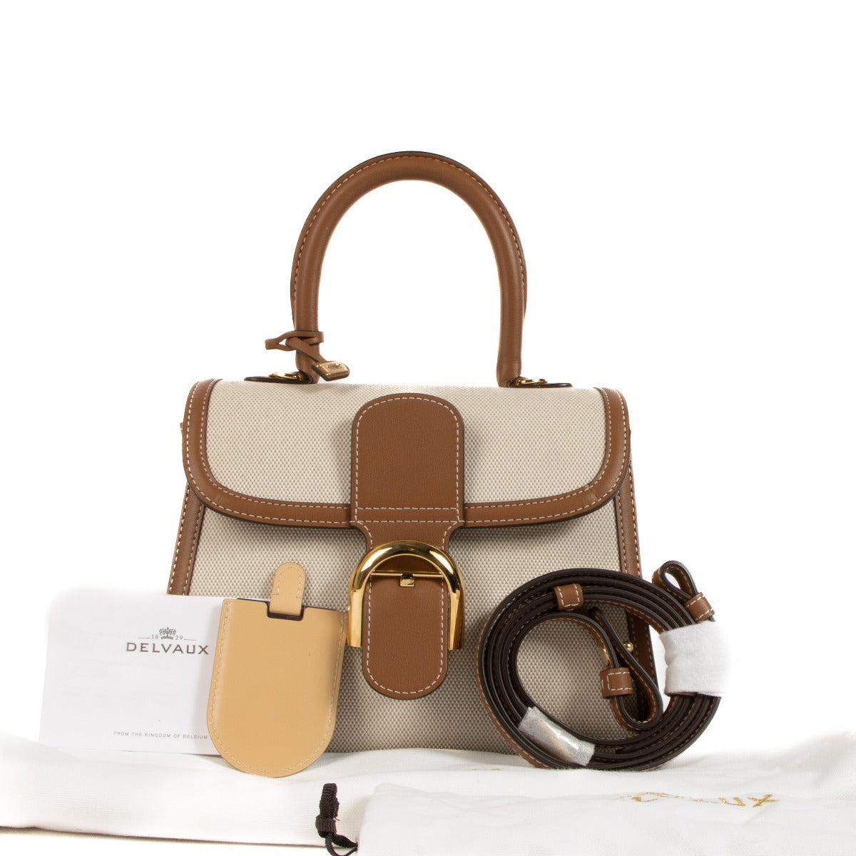Shop safe online at Labellov in Antwerp, Brussels and Knokke this 100% authentic second hand Delvaux Natural / Tan Calf Trim Canvas Brillant PM Bag