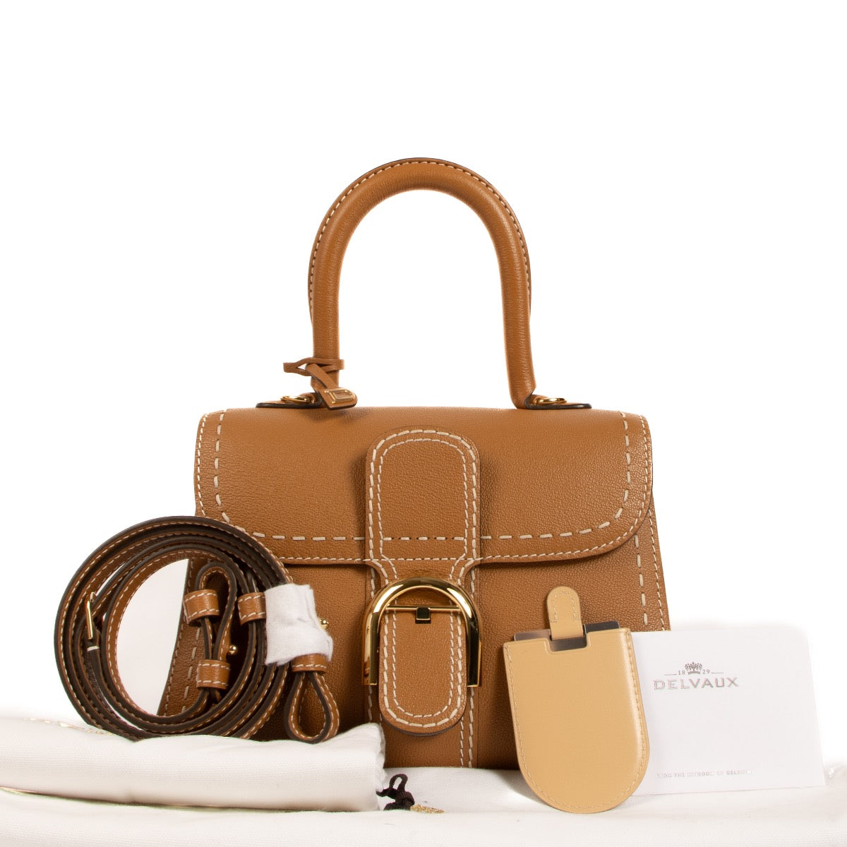 Shop safe online at Labellov in Antwerp, Brussels and Knokke this 100% authentic second hand Delvaux Végétal-Ivory Rodéo Calf Surpiqué PM Brillant