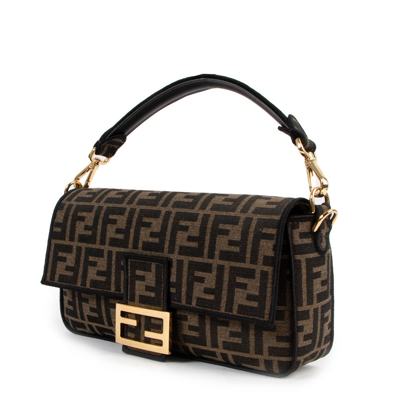 Medium Fendi Logo Brown Fabric Baguette Bag in FF logo for the best price secondhand available at Labellov. Buy and sell with confidence and ease online and with worldwide shipping.