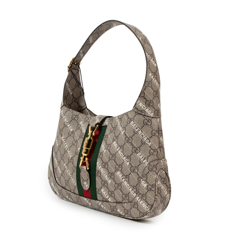 Gucci x Balenciaga The Hacker Jackie 1961 Small Shoulder Bag for the best price available at Labellov secondhand luxury in Antwerp. Brand new and never worn Gucci x Balenciaga The Hacker Jackie 1961 Small Shoulder Bag.